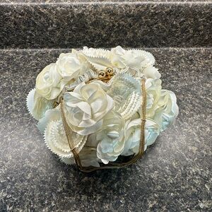 Sondra Roberts ivory silk floral clutch purse. Gold chain handle and hardware